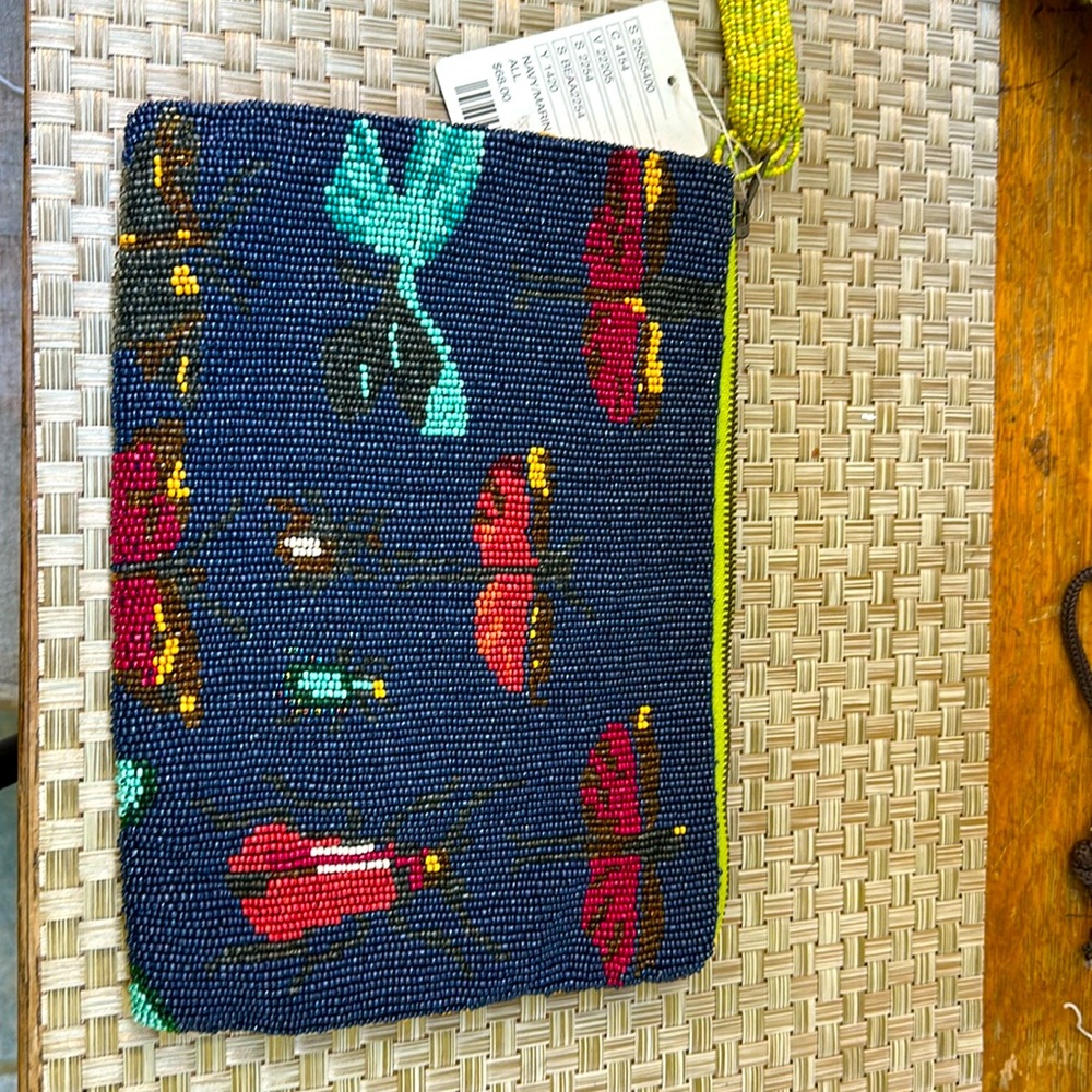 Beaded clutch with butterfly detail. Miss Albright for Anthropologie.